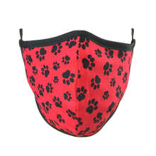 Load image into Gallery viewer, Namaske reusable fabric face mask with black paw prints on red fabric
