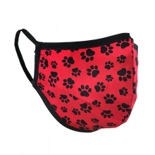 Load image into Gallery viewer, Namaske reusable fabric face mask with black paw prints on red fabric

